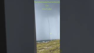 A Incredible Waterspout Touches Down at Panama City Beach in Florida During a Thunderstorm [upl. by Olaznog]