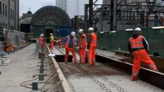 Taylor Woodrow VINCI Dockland Light Railway DLR Update 2  Construction Video Gateway Media CSR HampS [upl. by Elephus]