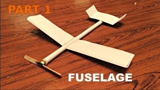 PART 1 How to make a rubber band powered plane with paper fuselage and propeller assembly [upl. by Eugine]