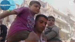 Syria war 2015 Aleppo schoolchildren pulled from rubble of bombed school [upl. by Panta]