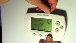 How to adjust time on Ouellet Thermostat [upl. by Ayimat902]