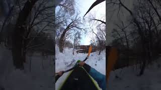 Kayak launches from a snowy ramp into the water [upl. by Immanuel]