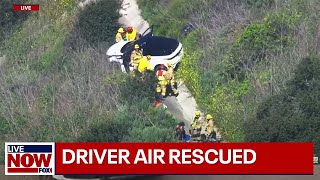 WATCH Helicopter air rescue of driver in Orange County California caught live  LiveNOW from FOX [upl. by Yenrab]