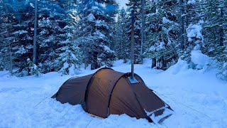 Hot Tent Camping In Heavy Snowfall [upl. by Ahsaelat]