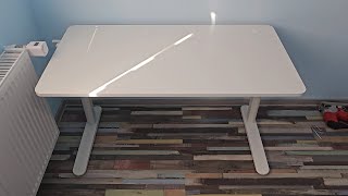 Assembling IKEA furniture  RELATERA  Underframe sitstand f table top desk [upl. by Akibma]