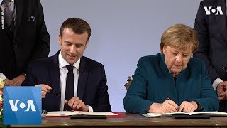 Merkel Macron Sign GermanyFrance Friendship Treaty [upl. by Nacnud453]