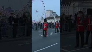 Troops march across Westminster bridge as they rehearse for the coronation [upl. by Bumgardner]