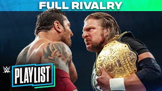 Batista vs Triple H – RIVALRY HISTORY WWE Playlist [upl. by Haroun]