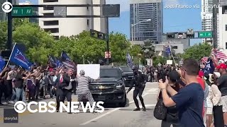 Protester detained after rushing Trumps motorcade outside Miami courthouse [upl. by Lebam]