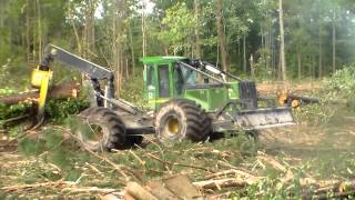 John Deere 848H Pulling Pines to the Deck [upl. by Elisa231]