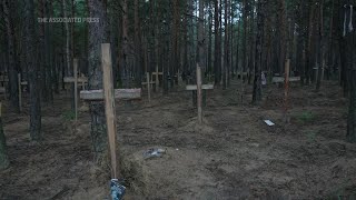 ONLY ON AP Mass graves found in Izium [upl. by Nivlad111]