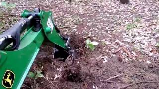 Removing an OLD Stump with the John Deere 1023e Backhoe [upl. by Anoel]