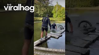 Bicyclist Falls Into Pond  ViralHog [upl. by Vada]