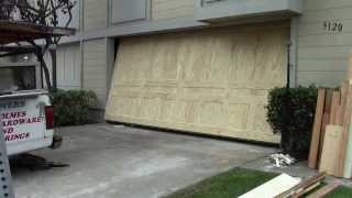 A wood one piece garage door [upl. by Adniralc]