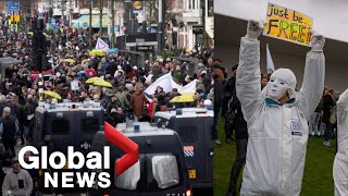 COVID19 Thousands protest lockdown measures in the Netherlands [upl. by Enedan]