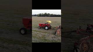 Raking with a 12 wheel Hesston rake [upl. by Eduardo976]