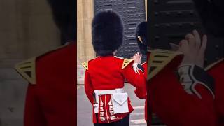 Kings guards show their identity pass to get into Buckingham Palace buckinghampalace [upl. by Shaner]