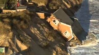 Aerial view homes fall into sea in Hemsby Norfolk after tidal surge [upl. by Fogel]