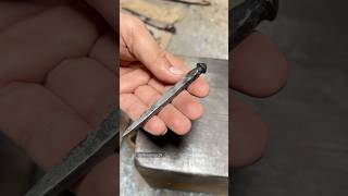 Forging a nail  Making a nail  Blacksmith Hmarmor29 [upl. by Ylimme]