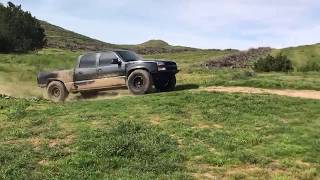 Silverado Long Travel Prerunner testing jumping [upl. by Airret]