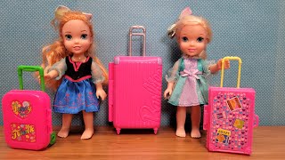 Luggage shopping  Elsa amp Anna toddlers are packing suitcase bags [upl. by Tartan353]