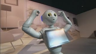 Robots take over phone store in Japan [upl. by Sharp430]