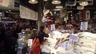 Fish throwing at Pike Place Fish Market in Seattle [upl. by Ahseenat82]