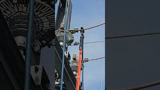 Grounding a high voltage wire with induction substation electrical maintenance [upl. by Cadmann]