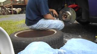 How to change rear brakes and rotors part 3 on a 2010 Dodge Challenger SRT8 [upl. by Teteak]