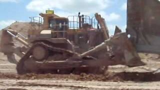 Two dozers moving a large dragline bucket [upl. by Lettig]