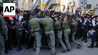 UltraOrthodox Jewish men protest in Jerusalem over potential law ending military exemption [upl. by Ardyce]