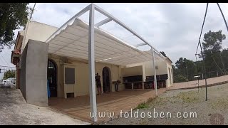 Pergola de hierro de 100x100 con toldo corredero manual tejido Soltis 96 de Serge Ferrari [upl. by Yrehc237]