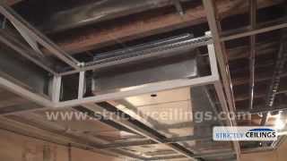 Installing Ceiling Drops For A Dropped or Suspended Ceiling [upl. by Sadira729]