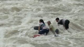 Firefighters Rescue Three from Flooded River in Southwest China [upl. by Correna]