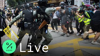 Hong Kong Makes First Arrest Under New National Security Law [upl. by Ahsihat580]