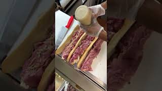 GIANT Corned Beef Mozzarella MUTZ Sandwich at Fiores Deli Hoboken New Jersey [upl. by Strawn]