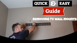 How To Remove A TV Wall Mount EASY [upl. by Tressia]