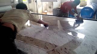 Applying epoxy  polymer to granite slab  India granite processing factory [upl. by Nomra]