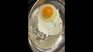 How to cook egg in steel pan without sticking shorts steelpan friedegg howtocookeggs ytshorts [upl. by Retlaw]