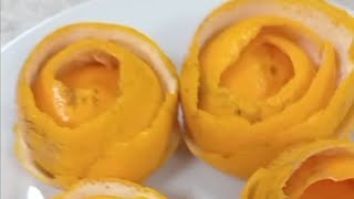 Cutting and twisting the orange peel into a rosette shape [upl. by Heigho]