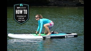 Standing up for the first time on a SUP  Getting into SUP how to video [upl. by Gratia]