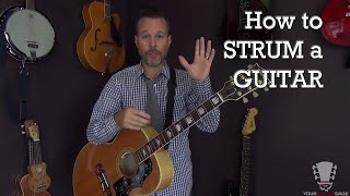 How to Strum a Guitar Correctly  Beginner Lesson [upl. by Amsirahc]