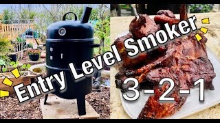 Smoking Ribs How I smoke meat on a budget upright smoker [upl. by Aseral]