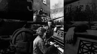 A Soviet tank man plays a piano in Berlin 1945 ytshort ww2 soviet tankman piano [upl. by Bonine647]