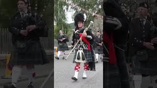 Drum Major Rennie leading Kintore Pipe Band marching to 2023 Braemar Gathering in Scotland shorts [upl. by Asikal227]