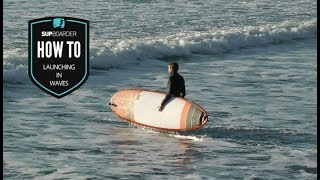 Launching a SUP in waves  How to video [upl. by Uno]