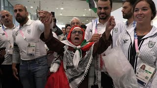 Palestinian Olympic delegation arrives ahead of Paris 2024 Games  AFP [upl. by Ynohtnakram535]