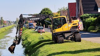 Mobilbagger Volvo EW140D bei Kanalräumarbeiten 2024  Wheeled excavator Volvo EW140D [upl. by Euk]