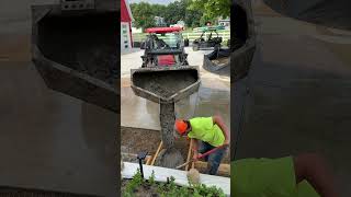 PRECISION POURING WITH A CONCRETE BUCKET ON A KUBOTA L6060 tractor kubota concrete [upl. by Aivila]