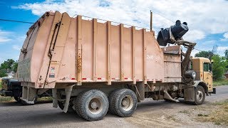 Peterbilt 320  Heil Formula 7000 Garbage Truck [upl. by Kentigerma]